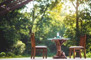 a table and chairs on a patio Things To Do In Dandeli